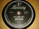 RUSTY DRAPER : BUZZ BUZZ BUZZ / I GET THE BLUES WHEN IT RAINS. Can 78rpm (1957)