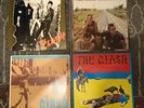 The Clash - four vinyl LPs: Combat Rock, Give 'em Enough Rope, Black Market,...