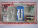 MODEL GARAGE ACCESSORIES SET WITH PETROL PUMPS, CAR RAMP. TYRE RACK ETC