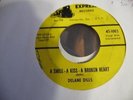 DELANE DILLS A SMILE - A KISS RARE ROCKABILLY 45 ON EXPRESS 1003  LISTEN