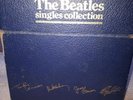 the beatles vinyl singles box set 45 rpm.