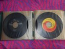 The Beatles 23 different 45 record in carrying case, Capitol, Apple, Swan Tollie