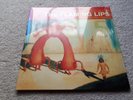 Flaming Lips Yoshimi Battles the Pink Robots, red vinyl LP, reissue