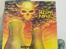 Nuclear Assault ?– Survive - LP record UK 1st 1988 - FLAG 21 - c/w lyric inner