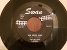 The Beatles 45 record SHE LOVES YOU, Swan Records, white paper sleeve only.