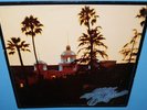 THE EAGLES   HOTEL CALIFORNIA LP    NEAR MINT ORIGINAL PRESS W/ POSTER