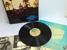 THE EAGLES   HOTEL CALIFORNIA LP    NEAR MINT ORIGINAL PRESS W/ POSTER