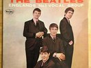 Introducing... The Beatles  Ad Back mono version 1 VJ 1062