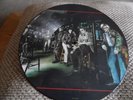 MARILLION. CLUTCHING AT STRAWS. PICTURE DISC.
