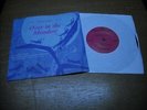SCHOLASTIC RECORD  OVER THE MEADOW  /  A ROCKET IN MY POCKET.  33 1/3 RPM.