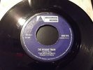THE REGGAE BOYS  THE REGGAE TRAIN / DOLLY HOUSE ON FIRE  7