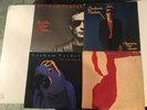 graham parker-squeezing out sparks-another grey-escalator-real macaw-mint vinyl
