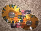 The Crystal Method - VEGAS, On Traslucent Orange With Blue Splatter