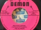 Olympics    Demon 1508  WESTERN MOVIES  (GREAT ROCK N ROLL 45) PLAYS LIKE NEW