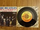 The Beatles “I Feel Fine” U.S. 1964 tab cut 7” picture sleeve + record vg+ cond