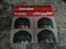 The Beatles And I Love Her / Ringo's Theme (This Boy) Record with Sleeve 45 RPM