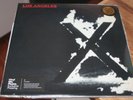 X Los Angeles #350 Numbered Colored Red Vinyl Me Please Remastered