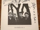 U2  BONO HAND SIGNED PRIDE IN THE NAME OF LOVE SLEEVE  UK 7