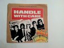 TRAVELING WILBURYS - HANDLE WITH CARE - 45 RPM + PIC. SLEEVE  (ORIGINAL) N MINT