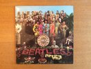 The Beatles ‘Sgt Peppers’ First Press Stereo Bi-fold sleeve with inner cutout. 