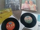 Oasis 4 x original 7 inch vinyl records from Be Here Now & Whatever new / sealed