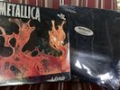 2 originally sealed Metallica LPs. Load And Enter Sandman