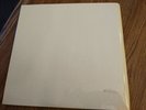 “The Beatles” 1968 early U.K. LP set pressing in near mint unplayed condition