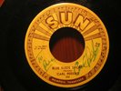 45 SUN 234 CARL PERKINS SIGNED