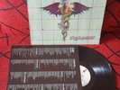 MOTLEY CRUE ** Dr. feelgood ** ORIGINAL 1989 Germany LP w/ INSERT IN SHRINKWRAP
