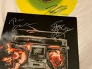 SIGNED TWENTY ONE PILOTS NEON YELLOW TRENCH VINYL + GREEN DAY REVOLUTION RADIO