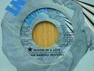 The Barrino Brothers soul 45 Trapped In A Love bw When Love Was A Child Invictus