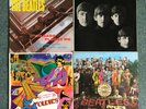 Four Beatles albums vinyl incl. “Please P Me”, “With the”, “Sgt. Pepper”, “Colle