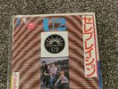 U2 A Celebration/Fire 7
