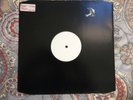 Roger Waters: Radio Waves 12” white label promo. Pink Floyd