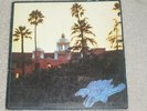 The EAGLES Hotel California Vinyl LP Record Album 1st Edition 1976 w/Poster