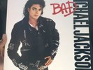 Micheal Jackson Bad Album Vinyl 12” And Moon Walk By Michael Jackson Book.