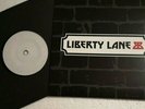 STATUS QUO - LIBERTY LANE / BACKBONE - UK 7
