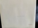 The Beatles: White Album by The Beatles  early pressing check number on cover
