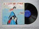 A TASTE OF TYKE LP  UGH magnum 100 SIGNED ex