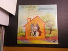 the  PARTRIDGE FAMILY RECORD ALBUM at home with their GREATEST HITS sealed