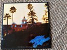 Eagles, Hotel California, 1976 Asylum Records /w Poster. Signed by Randy Meisner