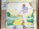 Elton John Goodbye Yellow Brick Road	LP translucent red EX/EX