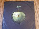 The Beatles ‘Get Back’ 1st press 1969 U.K. 7” record w/ solid center near mint-