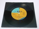 Neil Young:  Rockin in the Free World  EX+  7