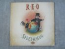 R.E.O. SPEEDWAGON   THE EARTH, A SMALL MAN, HIS DOG & A CHICKEN  VINYL RECORD LP