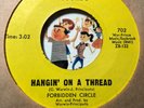 45 Forbidden Circle “ hangin’ on a thread / love comes in all colors “ funk