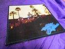 Eagles   Hotel California - on green vinyl ( wax )  with poster - GERMANY 1976
