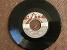 Slim Smith Keep That Light shining on Me/ Build My World Around You UN 537 1969
