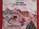 CARAVAN IN THE LAND OF GREY AND PINK SIGNED Pink Splatter vinyl ltd 500 RARE LP