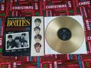 The Beatles gold colored LP record SONGS AND PICTURES OF THE FABULOUS BEATLES